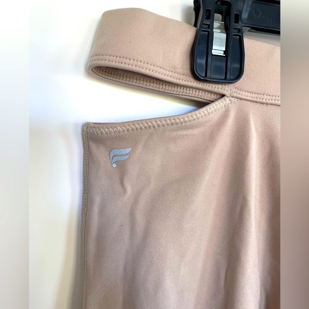 Fabletics beige high waisted leggings with cutouts at waist.  Size Lg